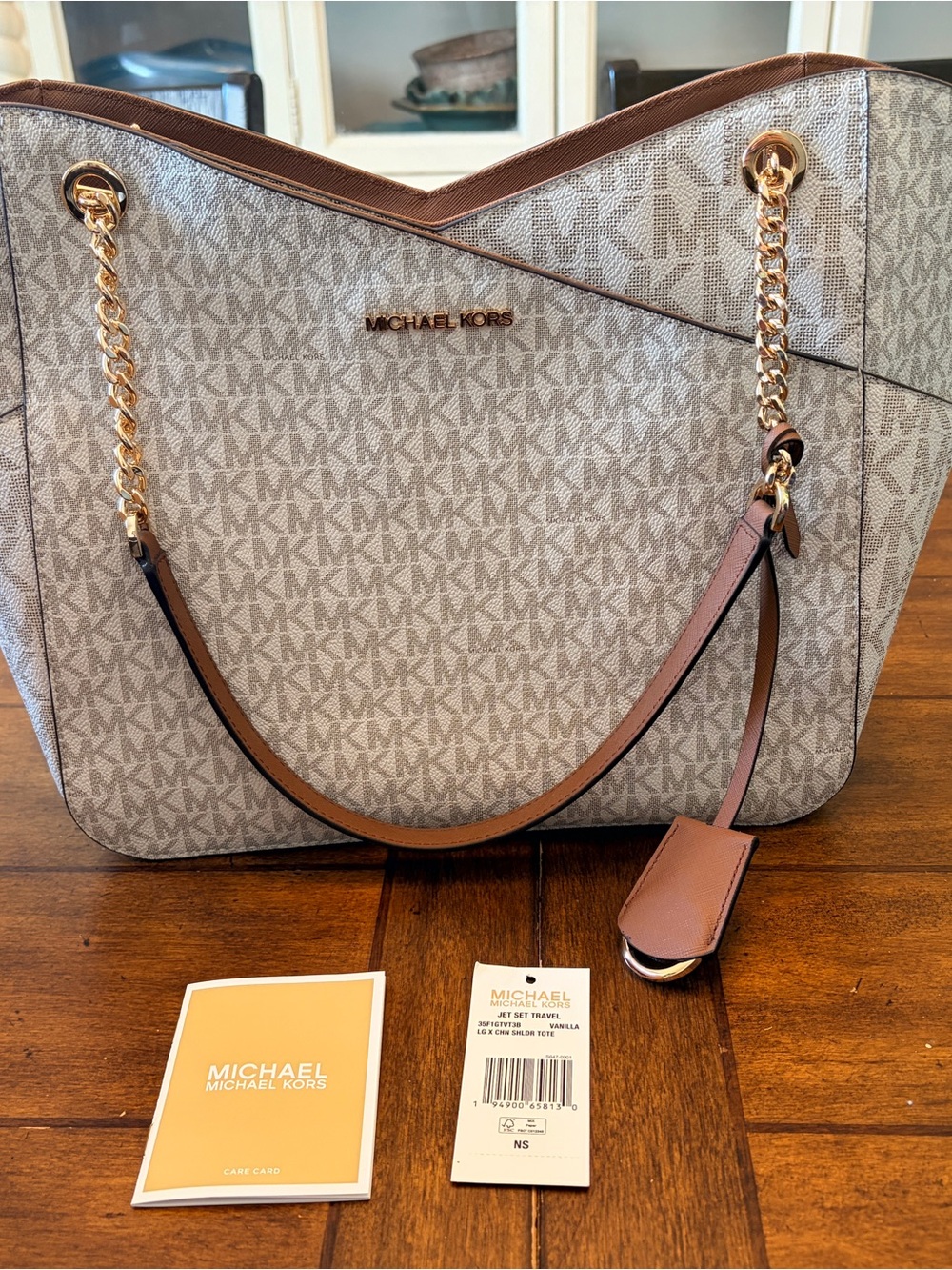 Michael Kors Beige Logo Tote with Brown Trim and Gold Chains